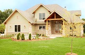 A stunning covered porch is a highlight of this custom Zach Builders home in the Jefferson County, Wisconsin town of Lake Mills