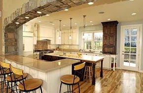 This huge kitchen features ample space to entertain and is a highlight of this custom home